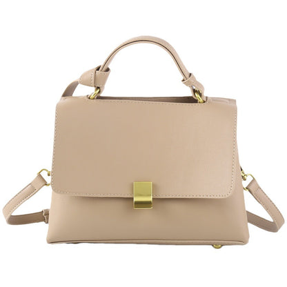 Simple solid color handbag with a slouchy shoulder strap